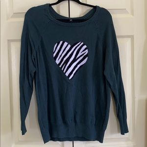 Lightweight sweater with cute heart.